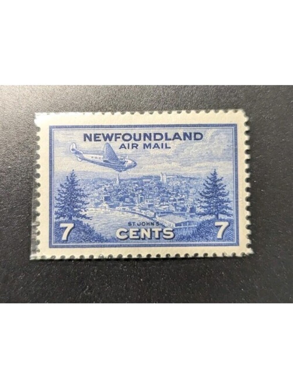 NEWFOUNDLAND C19 1943 7c ULTRAMARINE CBNC PLANE OVER ST JOHNS AIRMAIL VF MNH